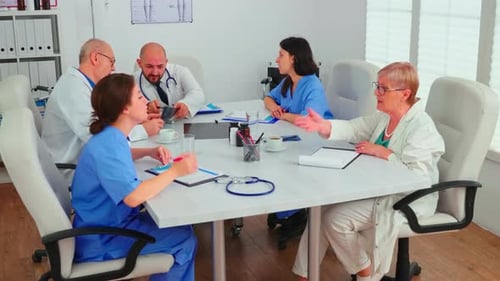 Medical Professionals Collaborate in Office Setting