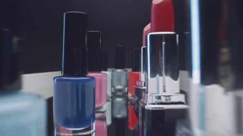 Cosmetics Lineup of Lipstick and Nail Polish Bottles