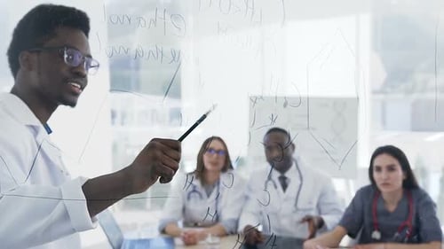 Medical Team Discussing Data in Modern Hospital