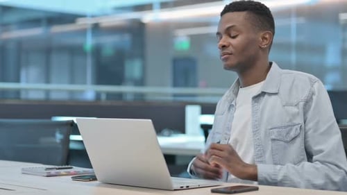 Adult Works on Laptop then Stretches Back
