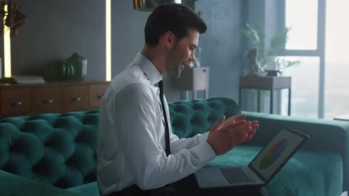 Professional Man Working Remotely on Video Conference