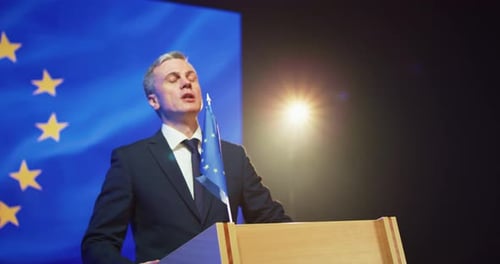 Adult Male Giving Speech Behind Podium