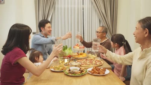Family Enjoys Meal Together at Home