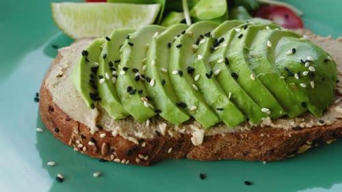 Avocado Toast with Salad and Lime Close Up