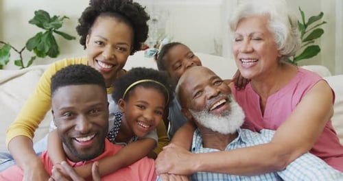 Happy Multi-Generational Family Smiling Together at Home