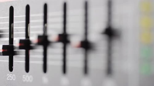 Old dusty audio console closeup. Equalizer.