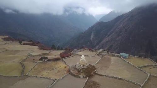 Buddhist Mountain Village With Stupa