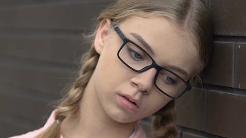 Upset Teen Girl Feeling Bored and Depressed, Lack of Friends, Introvert Closeup