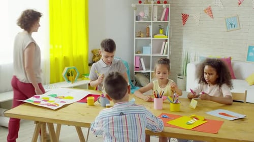 Children Doing Arts and Crafts with Teacher