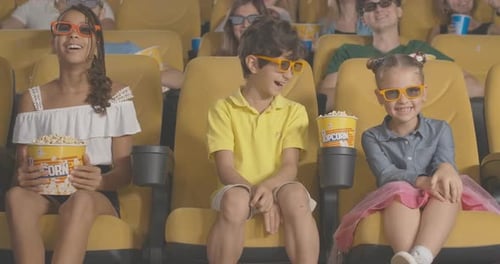 Portrait of Happy Multiethnic Children Watching 3d Comedy in Cinema. Cute Boy and Girls in 3d