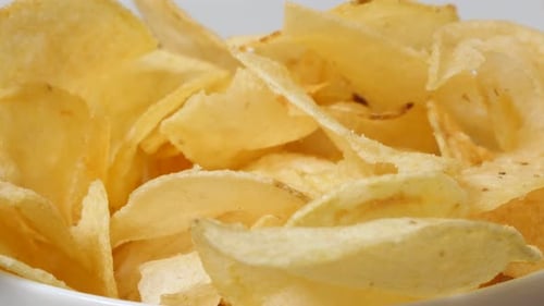 Crispy Potato Chips in a Bowl Close Up
