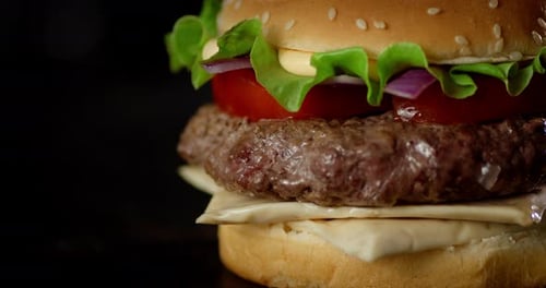 Close Up of Delicious Hamburger on Black