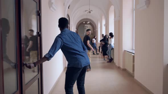 View From Back of Male Student Closing Door After Lesson, Education ...