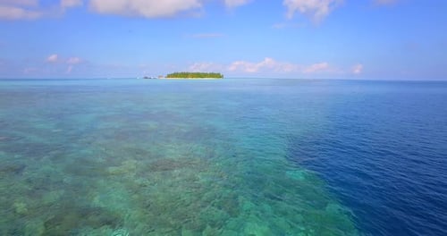 Aerial drone view of a scenic tropical island in the Maldives