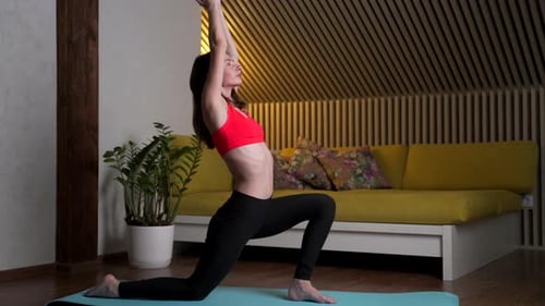 Woman Doing Yoga Stretching Exercise at Home