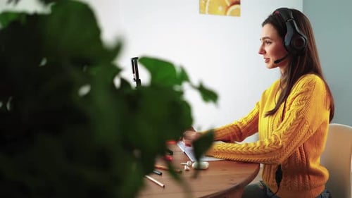 Woman on Video Call in Home Office