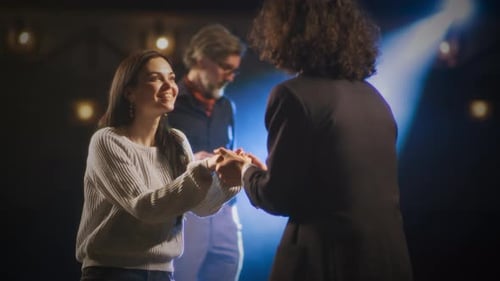 Actors Rehearsing Performance on Theater Stage