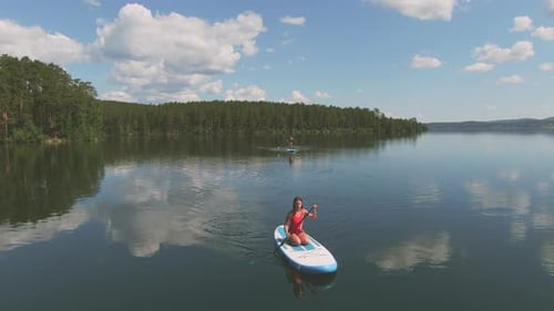 Sup Surfing on Lake in Daylight