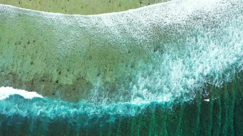 Aerial view landscape of idyllic tourist beach holiday by aqua blue sea with white sand background o