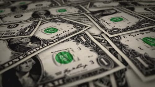 Dollar one banknote flying over money surface