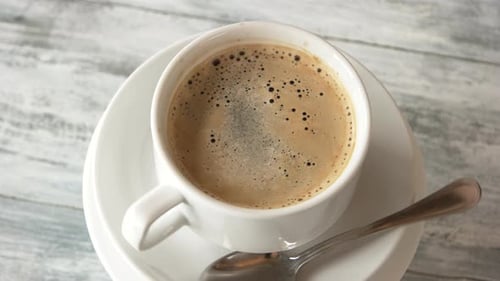 Coffee Cup on Wooden Table