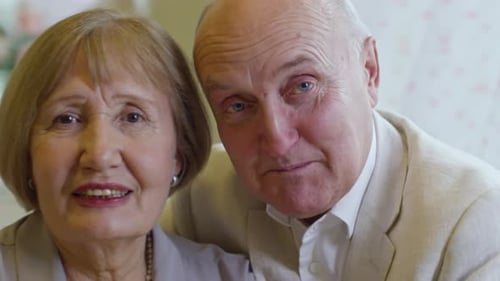 Senior Couple Smiling Together at Home