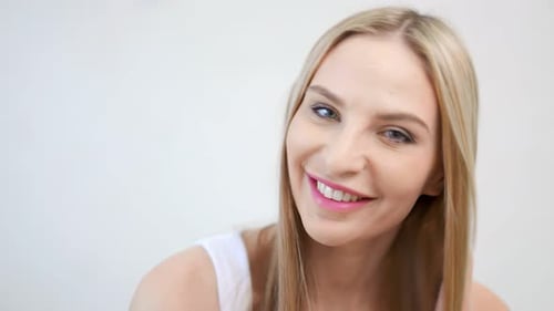 Smiling Woman Posing in a Close Up Headshot