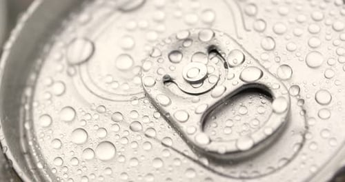 Refreshing Soda Can Covered with Droplets