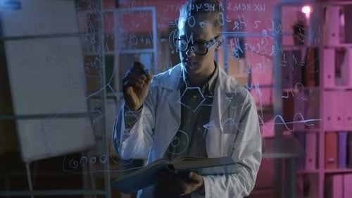 Scientist Writes Equations on Clear Board in Lab
