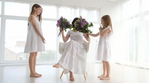 Mother with Daughters in Studio