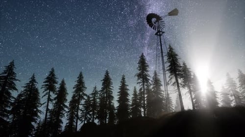 Retro Windmill in Mountain Forest