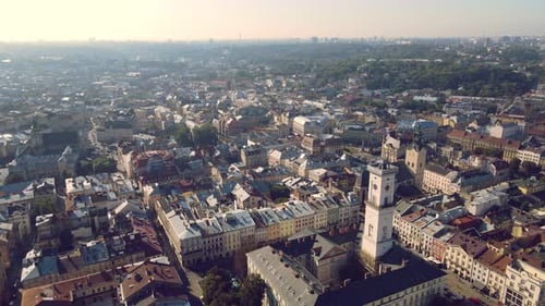 Flight Over Roofs, Streets. Aerial Drone Video of City Lviv, Ukraine. Market Square and the Central