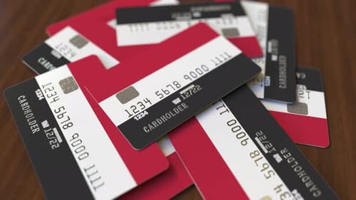 Pile of Credit Cards with Flag of Yemen