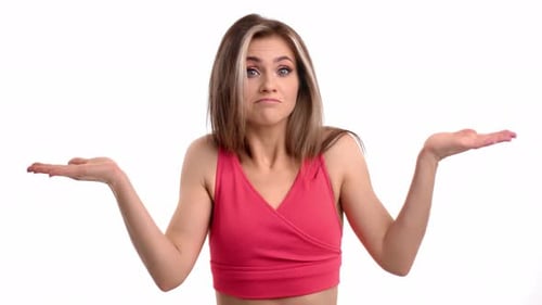 Woman Shrugs with a Confused Expression