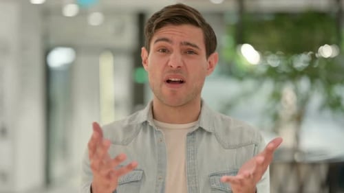 Portrait of Angry Creative Young Man Arguing Fighting