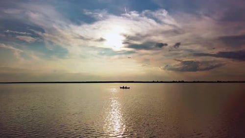 Aerial Drone Footage of Lake Against Sky