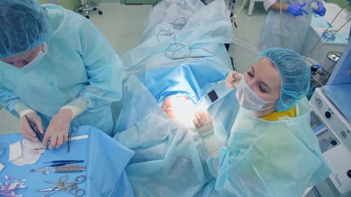 Surgical Team Performing Operation in Hospital Operating Room