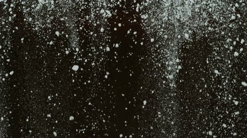 Closeup of coffee creamer pouring, shot with Phantom Flex 4K at 1000 frames per second