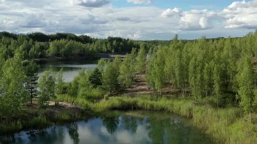 Flying above the lake in the abandoned clay quarry