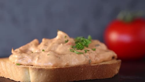 Creamy Spread on Toast with Herbs and Tomato