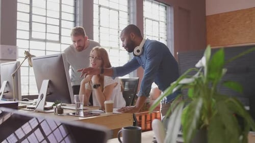 Young creative professionals working in a modern office