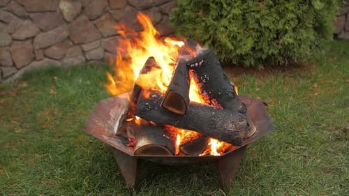 Roaring Fire in Outdoor Fire Pit