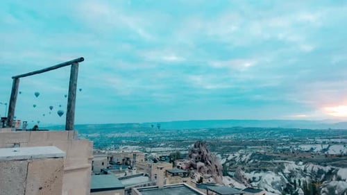 Timelapse of Flying Hot Air Balloons Over Ancient City in Cappadocia at Sunrise
