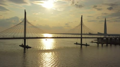 Cable-stayed Bridge and New Skyscraper at Sunset