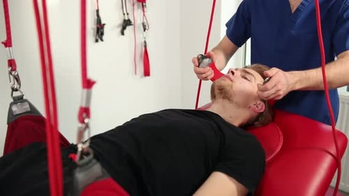 Patient Receives Neck Therapy in Medical Clinic