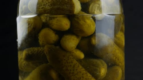 Bank of canned cucumbers
