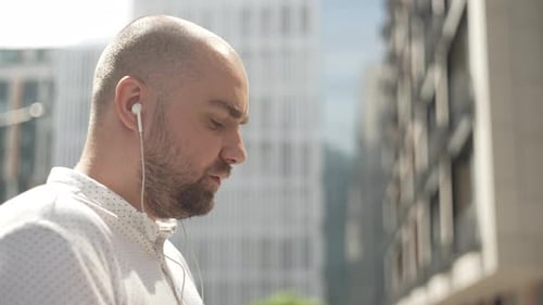 Man Drinking Coffee Outside in City, Close Up