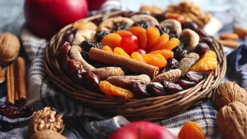 Dried Fruits and Nuts in Wicker Basket