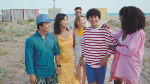 Group of friends having fun on the beach.