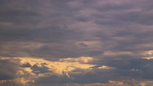 Golden Clouds Moving at Sunset Time-Lapse